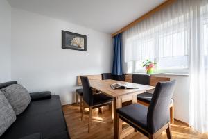 A seating area at Ferienwohnungen Plattnerhof