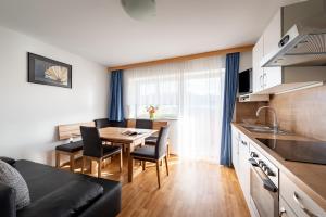 A kitchen or kitchenette at Ferienwohnungen Plattnerhof