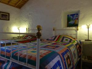 A bed or beds in a room at Quinta do Espírito Santo