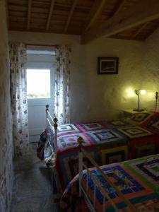 Postel nebo postele na pokoji v ubytování Quinta do Espírito Santo