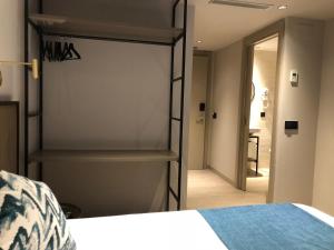 HOTEL TORRENT客房内的一张或多张床位