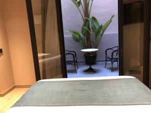 HOTEL TORRENT客房内的一张或多张床位