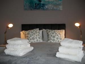 Ένα ή περισσότερα κρεβάτια σε δωμάτιο στο Westpark Apartment