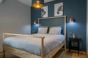 Ένα ή περισσότερα κρεβάτια σε δωμάτιο στο La Plaza