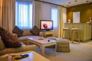 A television and/or entertainment centre at Hotel Europa