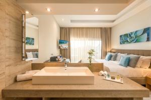Гостиная зона в Caneiros Luxury House & Suites
