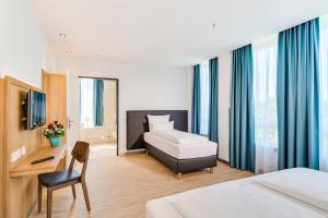 Postel nebo postele na pokoji v ubytování Hotel-Etage Apfelrot + 29 fotografií