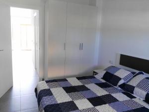 Postel nebo postele na pokoji v ubytování PRECIOSO APARTAMENTO EN PRIMERA LINEA DE MAR