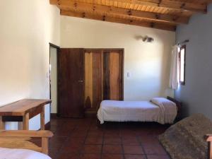 Ένα ή περισσότερα κρεβάτια σε δωμάτιο στο El Viento De Mi Sueño