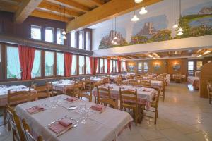 Reštaurácia alebo iné gastronomické zariadenie v ubytovaní GH Hotel Fratazza