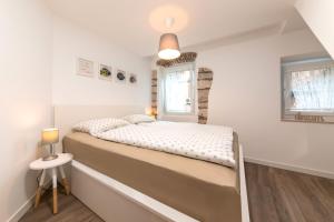 Postel nebo postele na pokoji v ubytování Mariva Downtown apartment with free parking