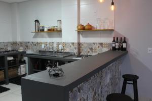 Η κουζίνα ή μικρή κουζίνα στο Rosa Surf Hostel & Food