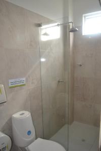Kylpyhuone majoituspaikassa Hotel Calarca Plus