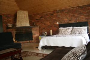 Säng eller sängar i ett rum på Naturaleza Muisca