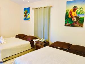 Letto o letti in una camera di The Log Cab-Inn