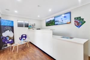 TV a/nebo společenská místnost v ubytování First City Caravilla