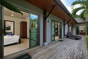 Postel nebo postele na pokoji v ubytování Baan Bua Estate by Tropiclook + 37 fotografií