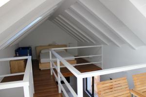 Poschodová posteľ alebo postele v izbe v ubytovaní Apartamentos Coronado + 37 fotografií
