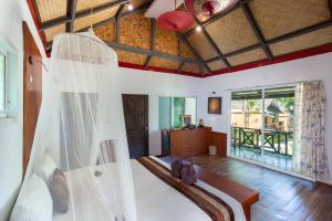 Letto o letti in una camera di Phi Phi Long Beach Resort & Villa