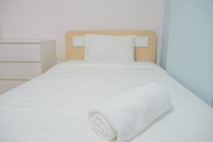 Katil atau katil-katil dalam bilik di Pleasant 2BR Apartment at Gateway Pasteur By Travelio