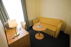 Ein Sitzbereich in der Unterkunft Hotel Wiking