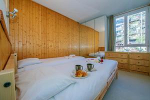 Sainte-Foy-l'Argentiere Apartment Sleeps 4にあるベッド