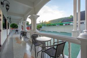 Balcony o terrace sa Happiness Guesthouse