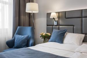 Posteľ alebo postele v izbe v ubytovaní Hotel Włoski Italia Boutique Old Town Poznań