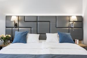 Posteľ alebo postele v izbe v ubytovaní Hotel Włoski Italia Boutique Old Town Poznań