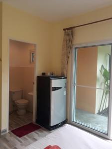 Ein Badezimmer in der Unterkunft Khanom Garden Suite