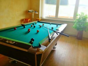 Biliár nebo kulečník v ubytování Hotel Kaltenbach