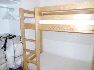 Palanda nebo palandy na pokoji v ubytování Appartement Iwan