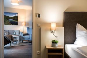 Postel nebo postele na pokoji v ubytování Müritzpalais + 33 fotografií