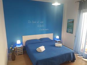 Postel nebo postele na pokoji v ubytování Casa Vacanze Trinacria