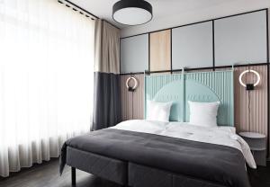 Letto o letti in una camera di CPH Hotel