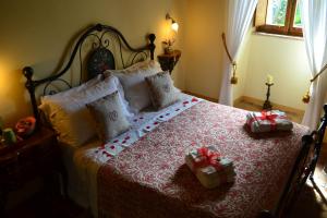 Postel nebo postele na pokoji v ubytování B&B Palazzo La Loggia