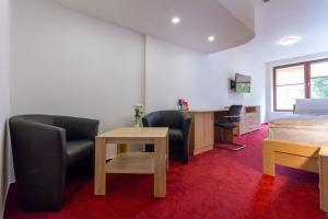 Katil atau katil-katil dalam bilik di Hotel Ungar