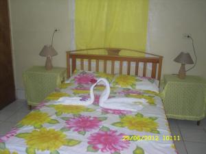 En eller flere senge i et værelse på Hotel Mirador