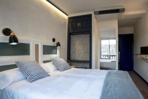 Cama o camas de una habitación en Hotel Alda Jolio Jaca