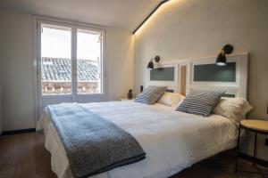 Cama o camas de una habitación en Hotel Alda Jolio Jaca