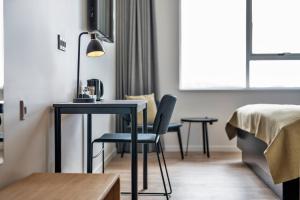 Katil atau katil-katil dalam bilik di KOMPAS Hotel Aalborg