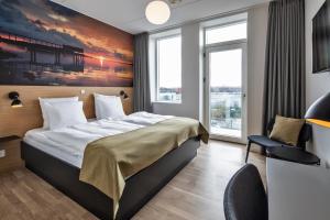 Katil atau katil-katil dalam bilik di KOMPAS Hotel Aalborg