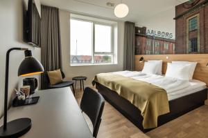 Katil atau katil-katil dalam bilik di KOMPAS Hotel Aalborg