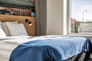 Katil atau katil-katil dalam bilik di KOMPAS Hotel Aalborg