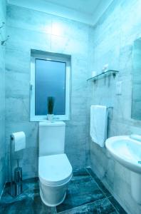 Ένα μπάνιο στο Santa Lucia B & B Suite