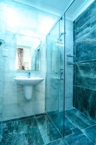 Ένα μπάνιο στο Santa Lucia B & B Suite