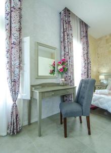 Ένα ή περισσότερα κρεβάτια σε δωμάτιο στο Santa Lucia B & B Suite