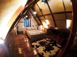 Cama ou camas em um quarto em Dahun Villas Siargao