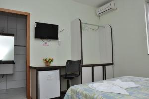 TV a/nebo společenská místnost v ubytování Hotel Lisbor