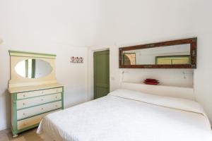 Trulli Masseria Donno Santo客房内的一张或多张床位